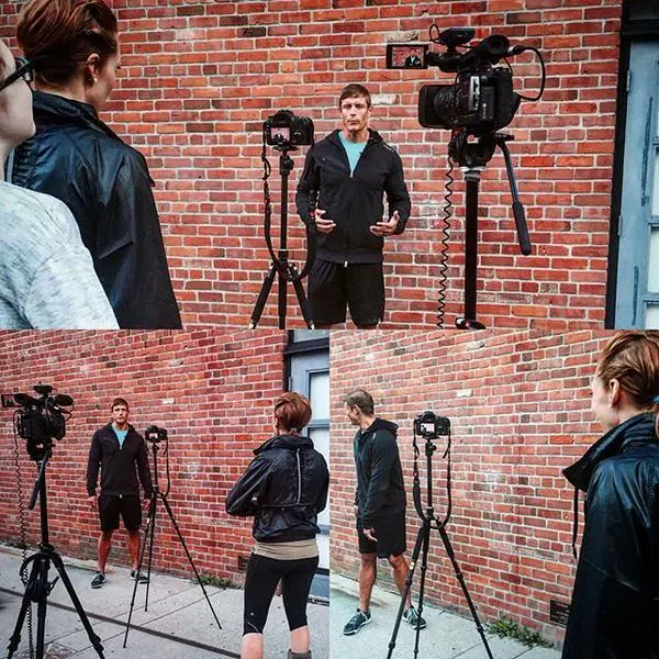 Dai being filmed for a media interview